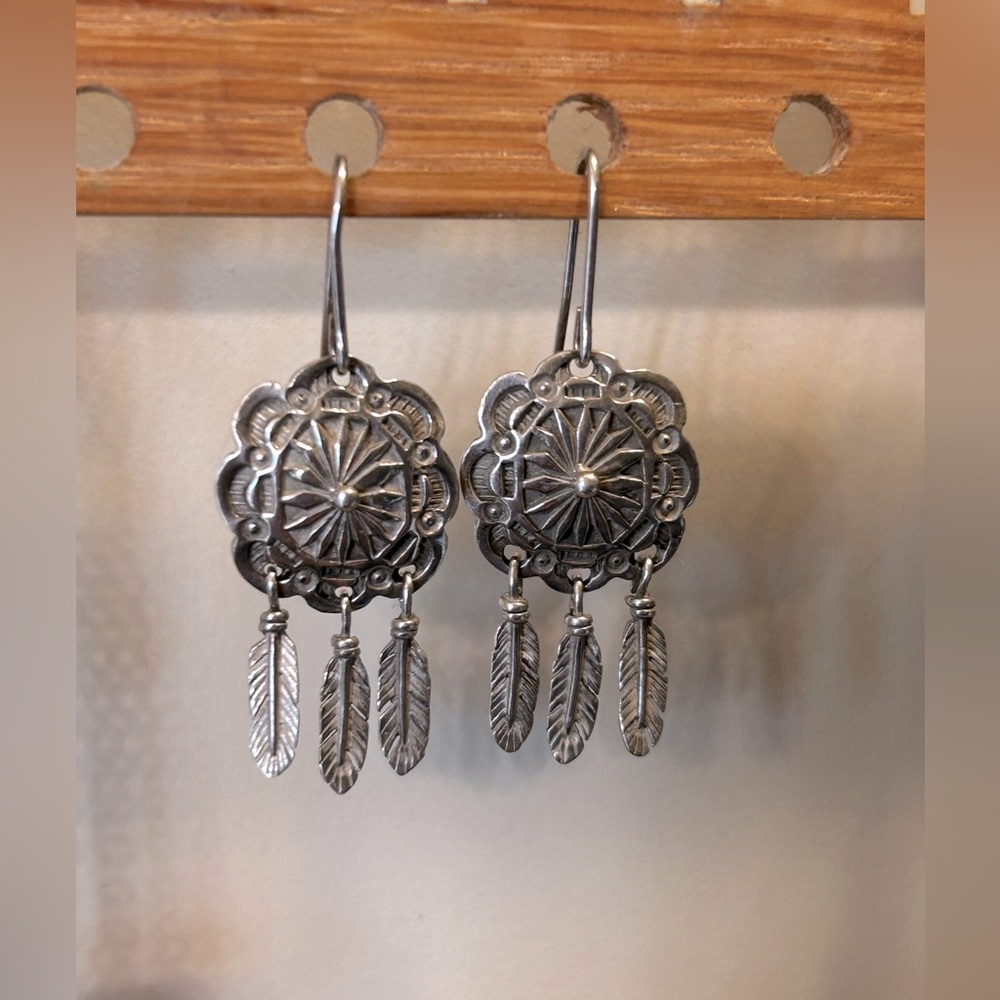 Southwestern dangling earrings with feathers. very lightweight, loop attachment
